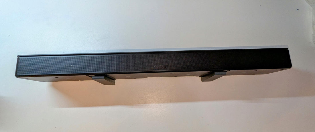 Soundbar wall mount for a clean home theater setup