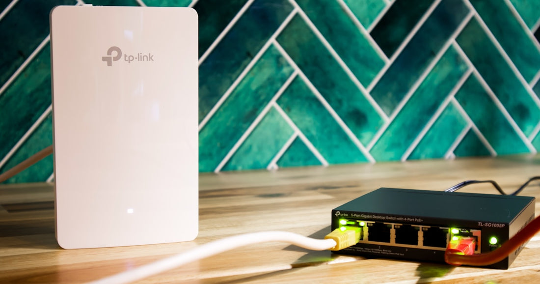 WiFi access point and PoE network switch on a desk for optimized home network setup