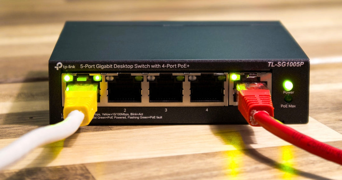 TP-Link network switch with ethernet cables for WiFi 7 access point connectivity