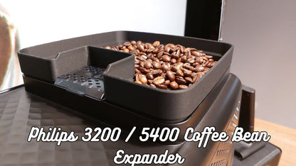 Fresh coffee beans in a latte go espresso machine hopper