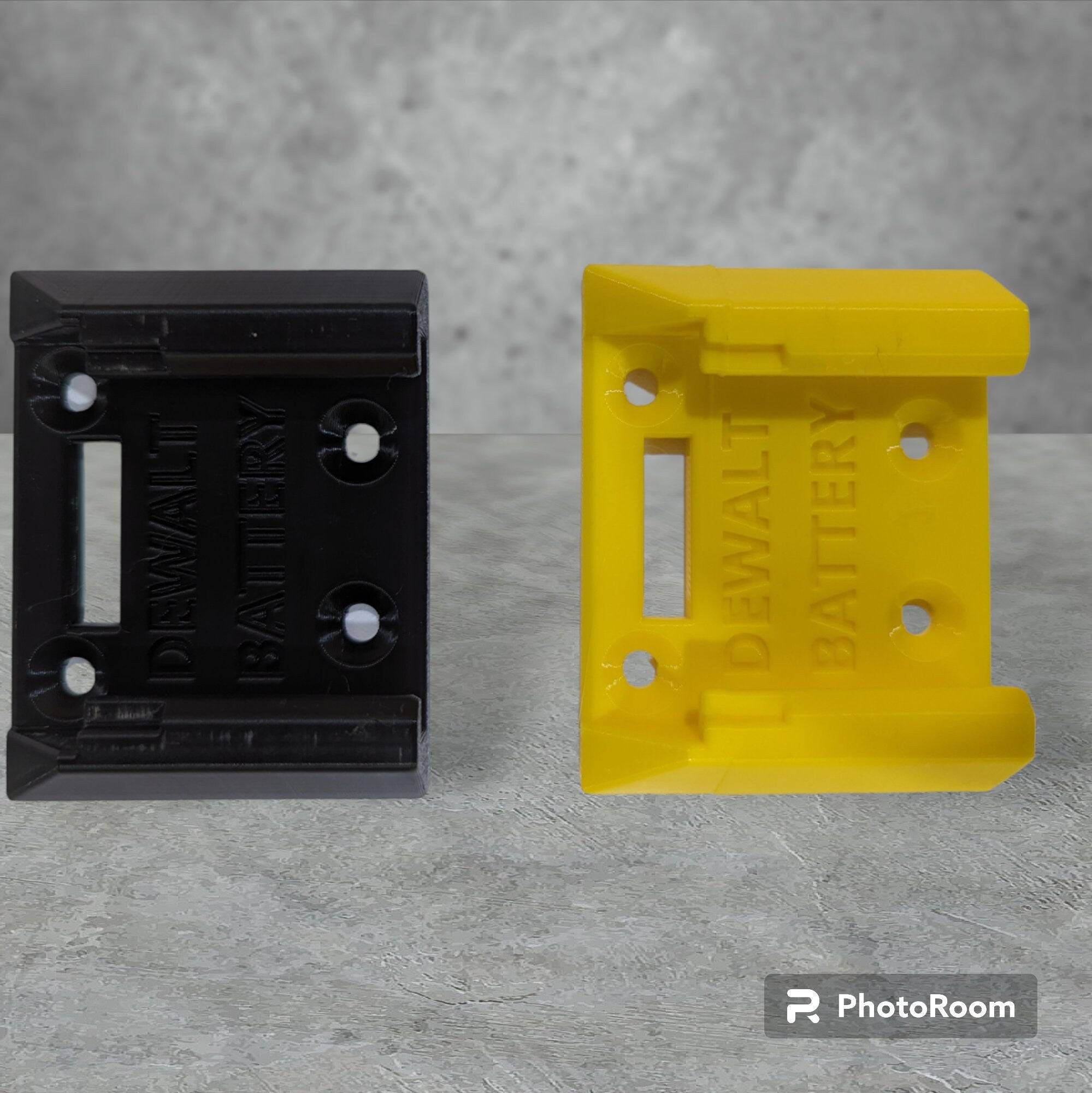 a couple of yellow and black dewalt 20v battery mounts