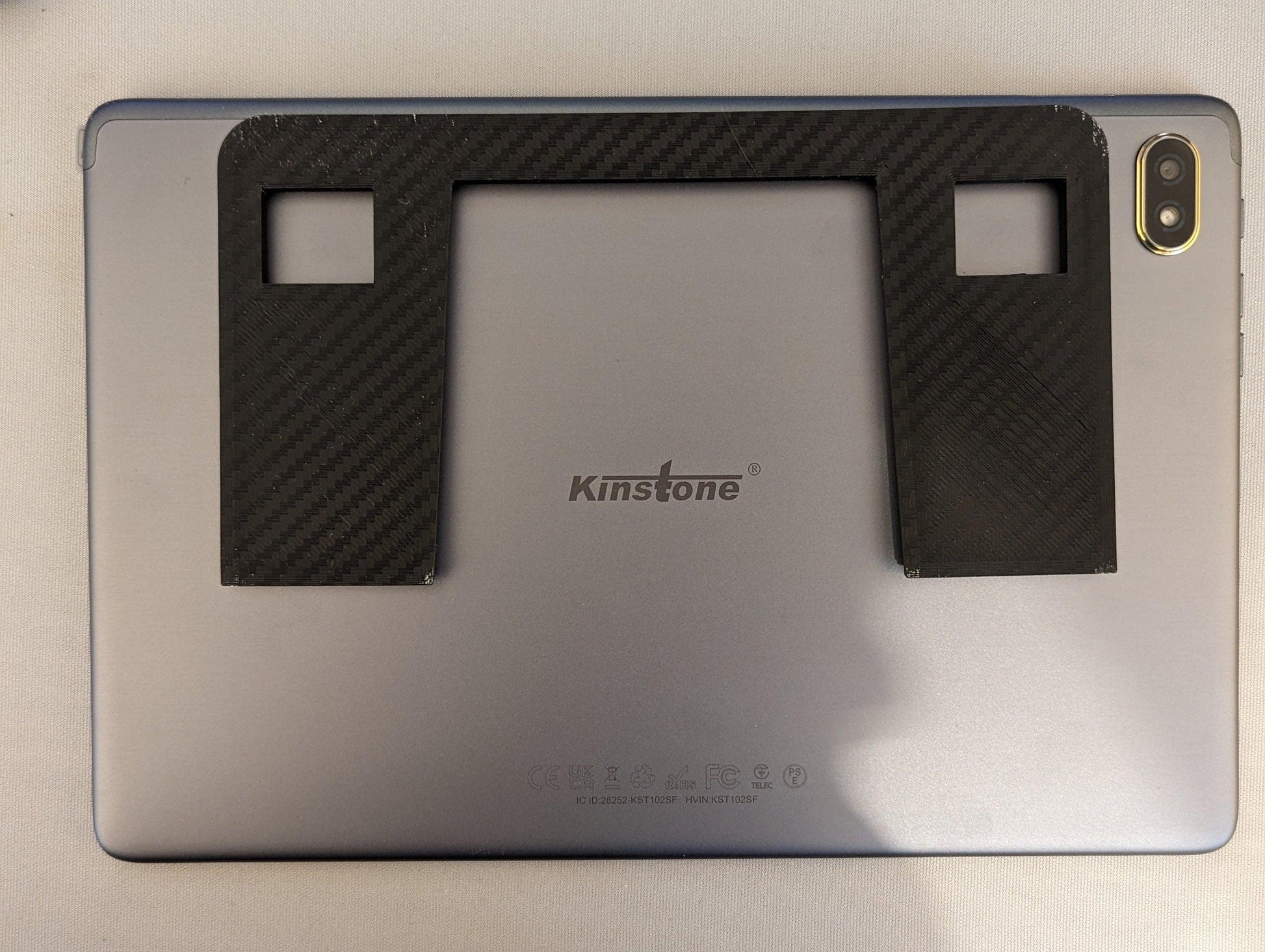 Low profile tablet mouning plate installed on a tablet